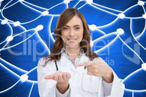 Composite image of smiling doctor presenting her hand