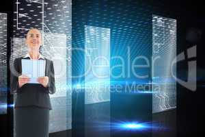 Composite image of businesswoman holding new tablet