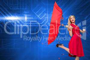 Composite image of elegant blonde holding umbrella