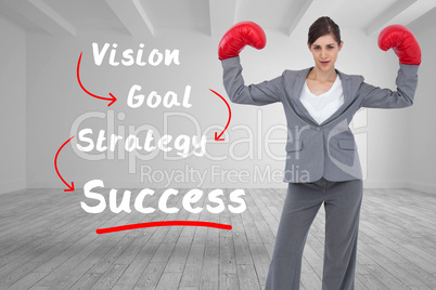 Composite image of businesswoman with boxing gloves Composite image of businesswoman with boxing gloves