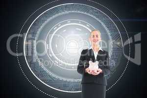 Composite image of businesswoman holding pink piggy bank