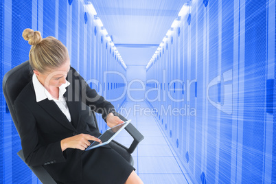 Composite image of businesswoman sitting on swivel chair with ta