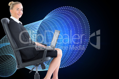 Composite image of businesswoman sitting on swivel chair with la