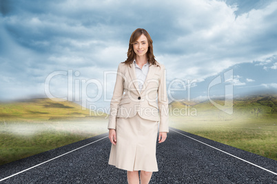 Composite image of smiling businesswoman walking