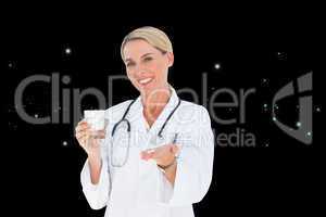 Composite image of happy doctor holding out pills and water glas