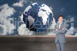 Composite image of assertive businessman standing