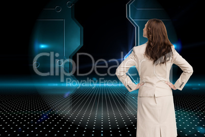 Composite image of businesswoman standing back to camera