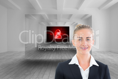 Composite image of businesswoman holding tablet