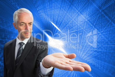 Composite image of concentrated businessman with palm up