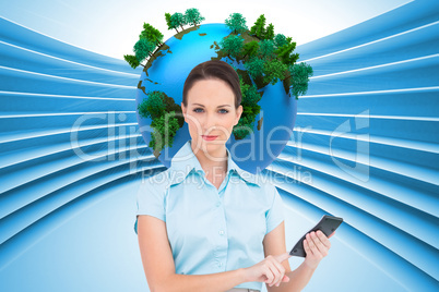 Composite image of serious classy businesswoman using calculator