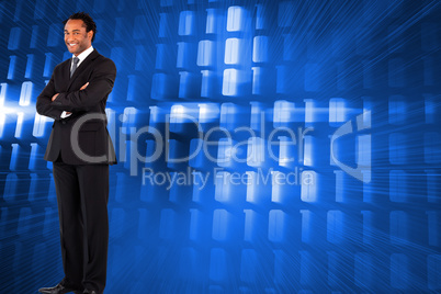 Composite image of businessman with folded arms