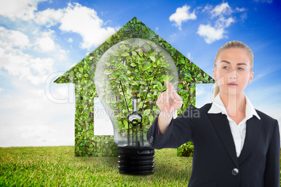 Composite image of businesswoman pointing somewhere