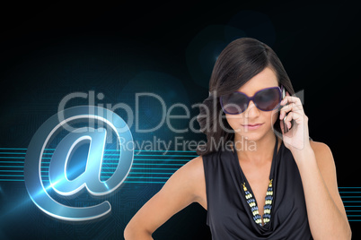 Composite image of serious elegant brunette wearing sunglasses o