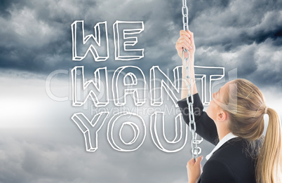 Composite image of businesswoman pulling a chain Composite image of businesswoman pulling a chain