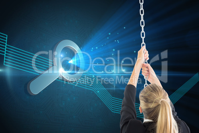 Composite image of businesswoman pulling a chain