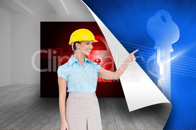 Composite image of smiling attractive architect pointing