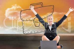 Composite image of businesswoman sitting in front of laptop with