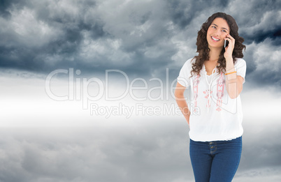 Composite image of attractive casual brunette having phone call