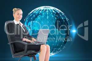 Composite image of businesswoman sitting in swivel chair with la