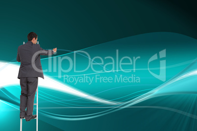 Composite image of businessman standing on ladder