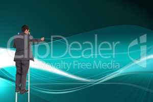 Composite image of businessman standing on ladder