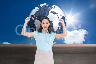 Composite image of victorious stylish businesswoman posing