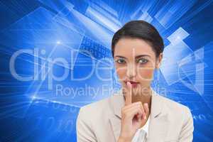 Composite image of young businesswoman asking for silence