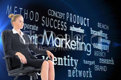 Composite image of businesswoman sitting on swivel chair in blac