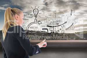 Composite image of businesswoman pointing somewhere