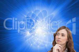 Composite image of thoughtful doctor looking away