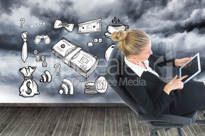 Composite image of businesswoman sitting on swivel chair with ta