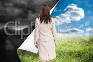 Composite image of classy businesswoman walking away from camera