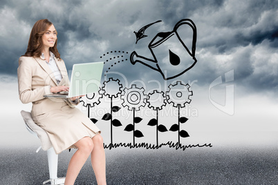 Composite image of smiling businesswoman sitting and using lapto