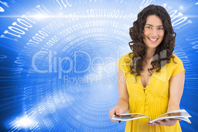 Composite image of cheerful curly haired brunette reading magazi