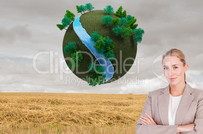 Composite image of confident female executive with folded arms