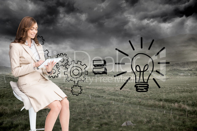 Composite image of happy businesswoman using tablet