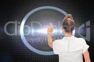 Composite image of businesswoman touching something