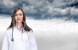 Composite image of happy doctor looking at camera