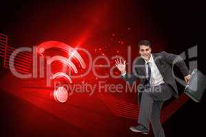 Composite image of happy businessman in a hury