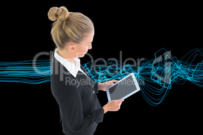 Composite image of businesswoman holding new tablet