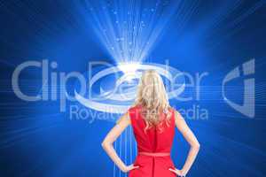 Composite image of elegant blonde standing hands on hips