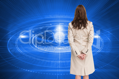 Composite image of rear view of businesswoman