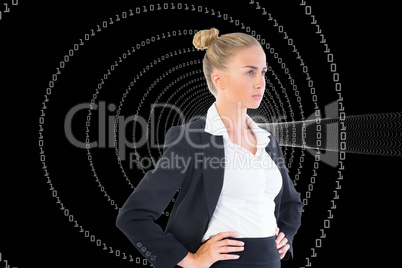 Composite image of businesswoman standing with hands on hips Composite image of businesswoman standing with hands on hips