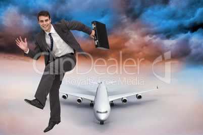 Composite image of smiling businessman in a hury
