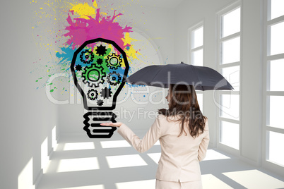 Composite image of elegant businesswoman holding black umbrella