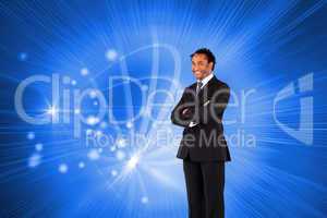 Composite image of businessman with folded arms