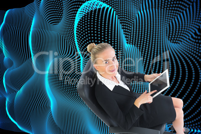 Composite image of businesswoman sitting on swivel chair with ta Composite image of businesswoman sitting on swivel chair with ta