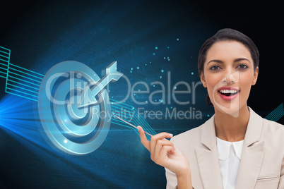 Composite image of smiling businesswoman holding a pen