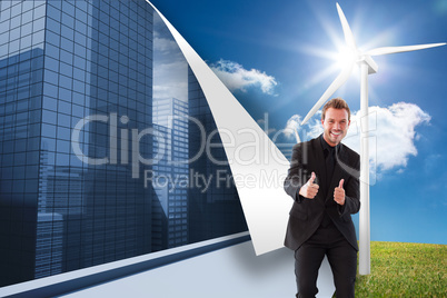 Composite image of businessman with thumbs up in a meeting