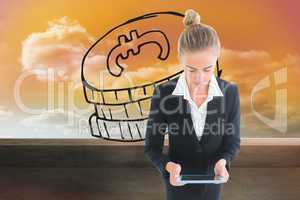 Composite image of businesswoman holding new tablet